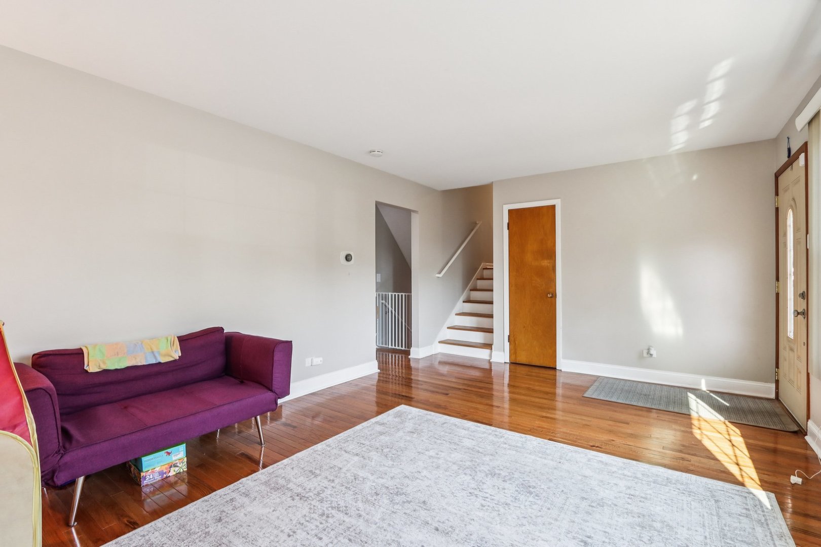 461 Ardmore Terrace Addison, IL 60101 - Photo 4 of 29 a livingroom with furniture and wooden floor