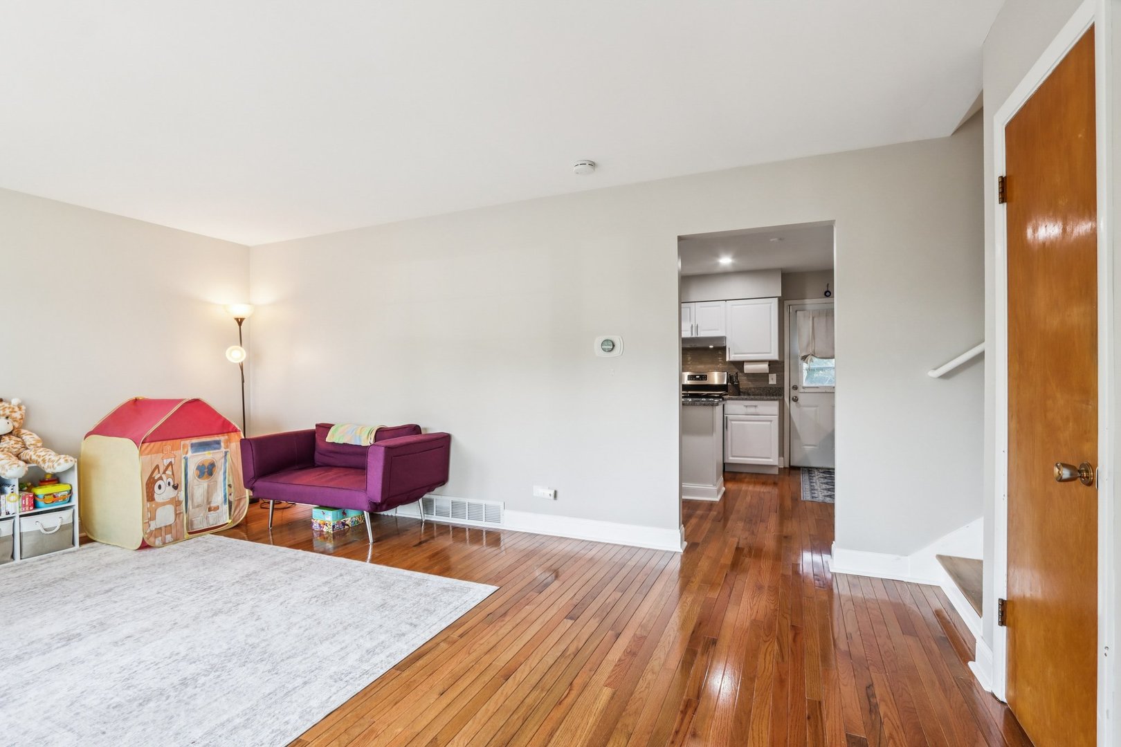 461 Ardmore Terrace Addison, IL 60101 - Photo 5 of 29 a living room with furniture and wooden floor