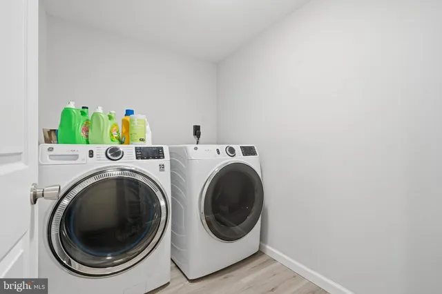 a utility room with dryer and washer