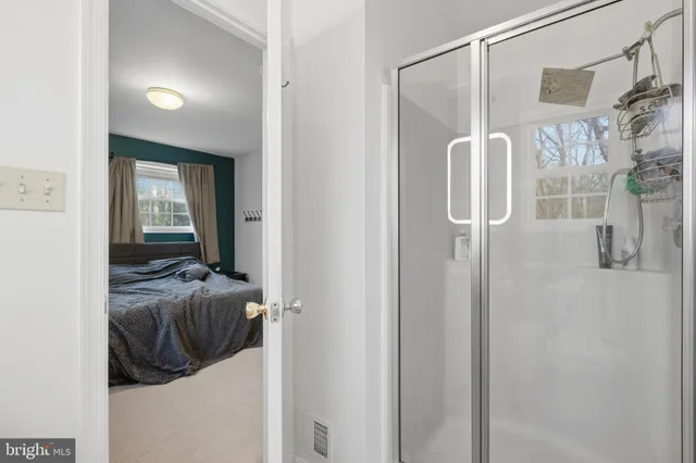 a en suite bathroom with a shower