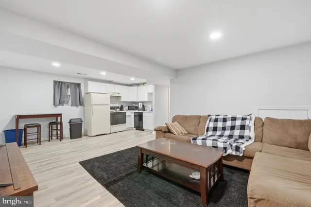 a living room with furniture and a table