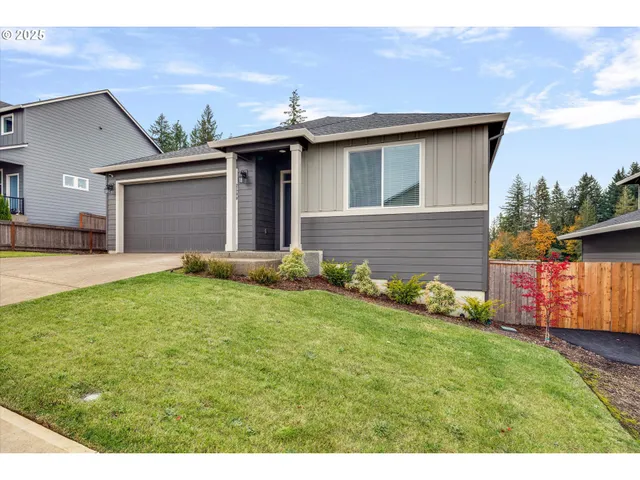 a backyard of a house with lots of green space