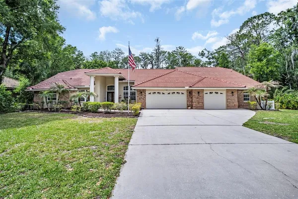 $1,225,000 | 1404 East Lake Woodlands Parkway, Oldsmar, FL 34677