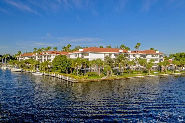 a view of a patio with a yard table and chairs