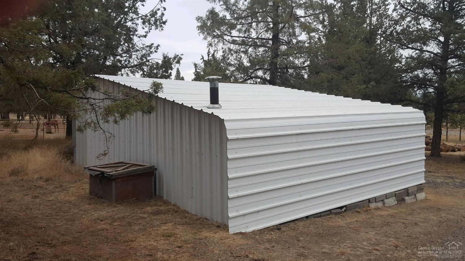 8518 Southwest Crater Loop Road Terrebonne, OR 97760 - Photo 22 of 24 Back of large storage shed.