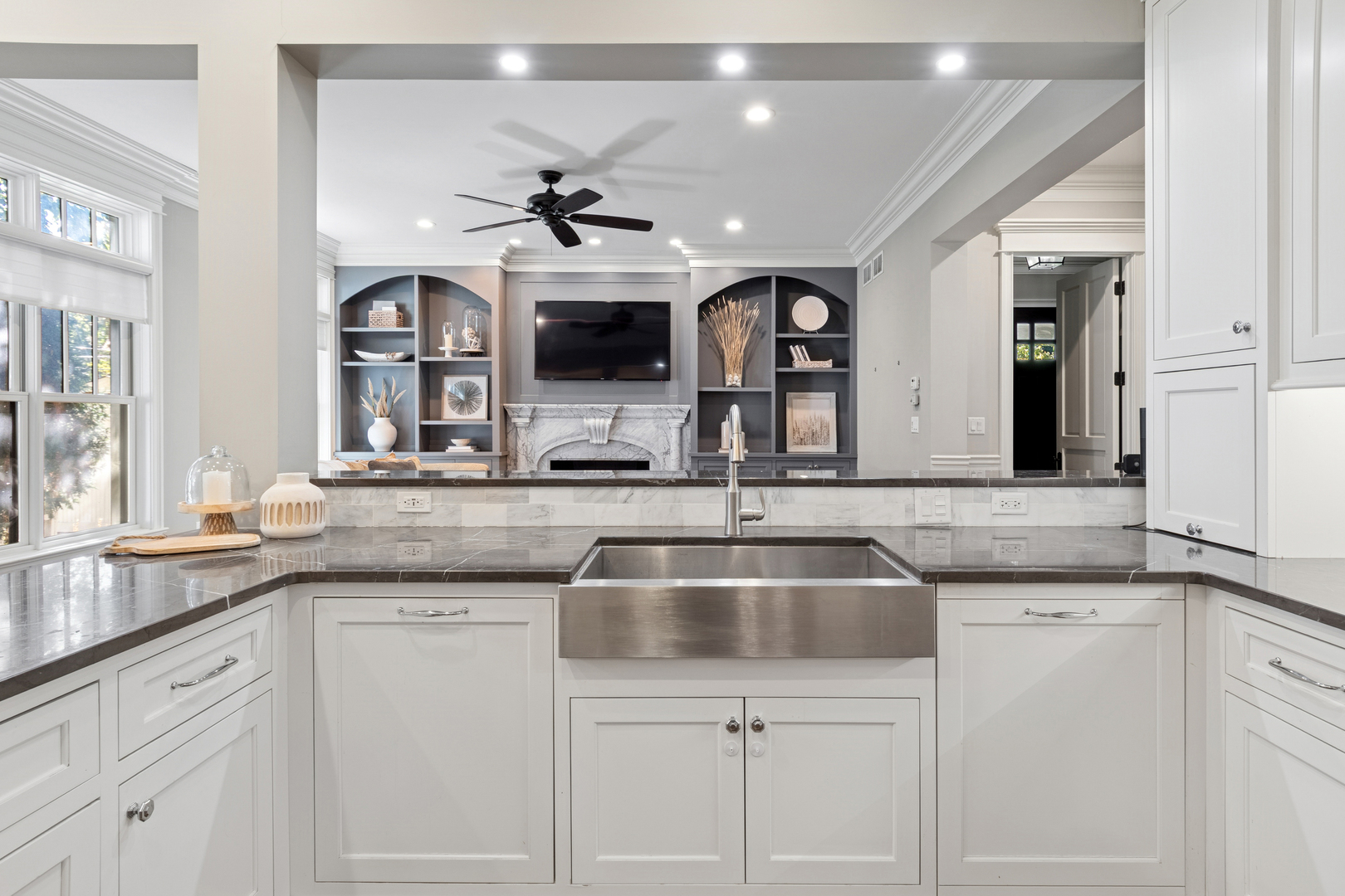 203 South Columbia Street Naperville, IL 60540 - Photo 8 of 59 a kitchen with stainless steel appliances granite countertop a sink and dishwasher with white cabinets