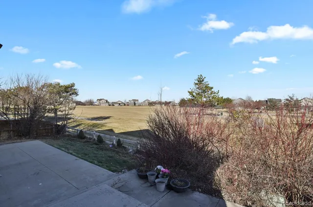a view of a road with a building in background