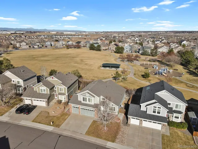an aerial view of residential building with outdoor space