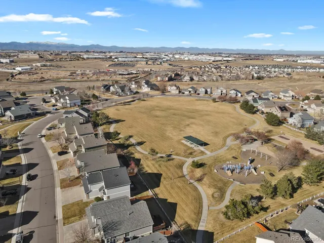 an aerial view of residential building with parking space