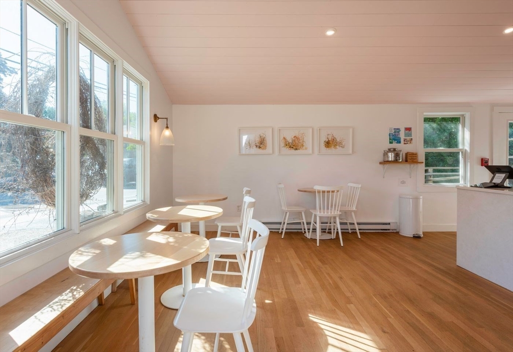 162 Main Street Essex, MA 01929 - Photo 12 of 26 a view of a dining room with furniture window and outside view