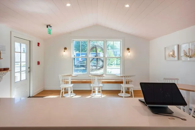 a kitchen with stainless steel appliances a sink a stove and a refrigerator