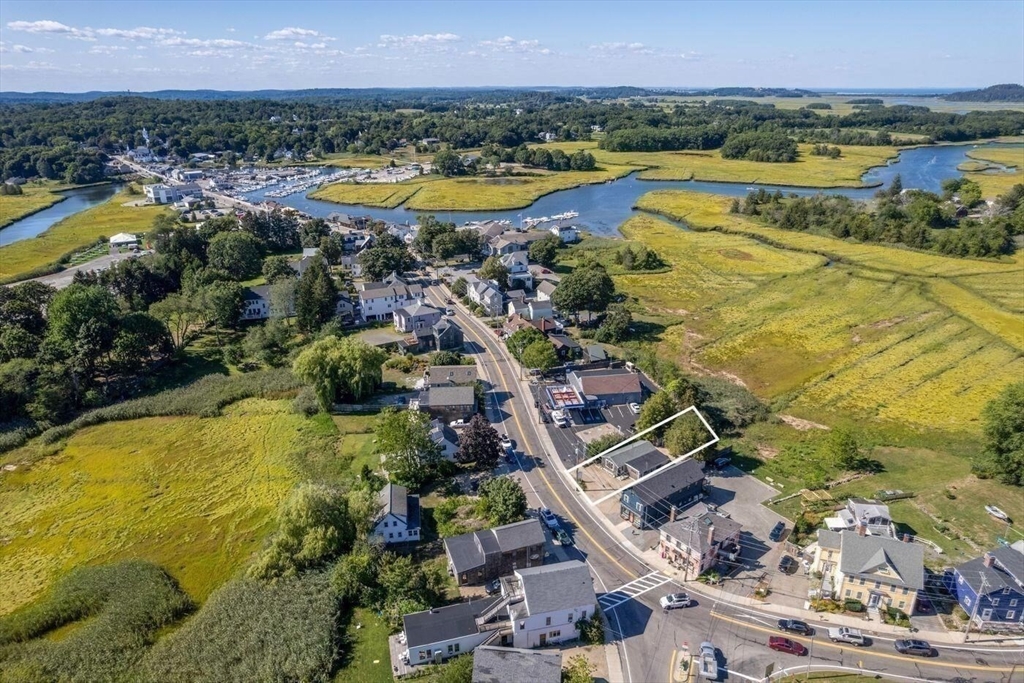 162 Main Street Essex, MA 01929 - Photo 7 of 26 a view of a city with an ocean view