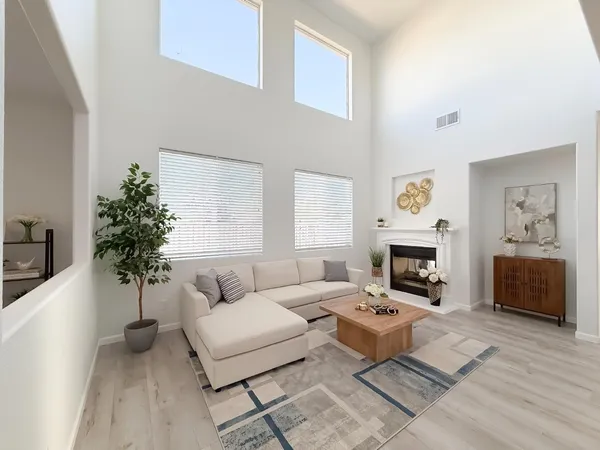 a living room with furniture and a window