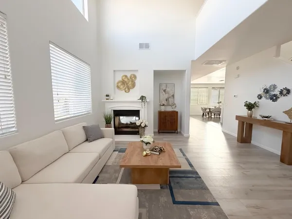 a work room with furniture and a window