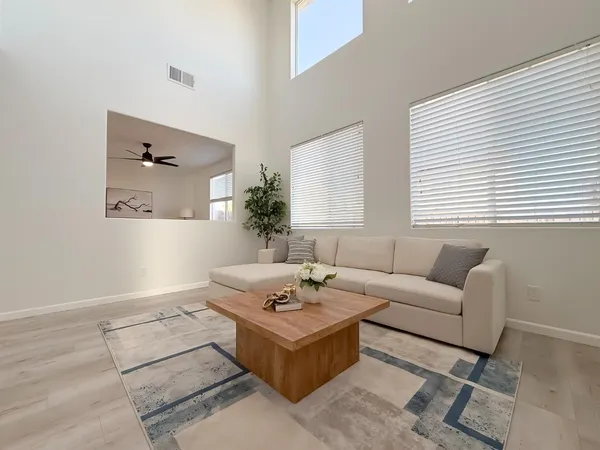 a workspace with furniture and window