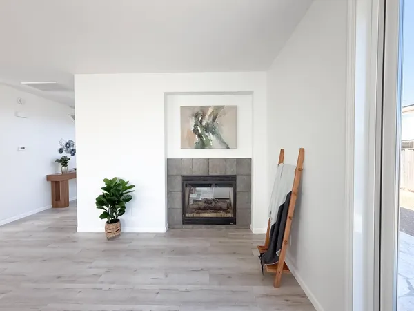 a spacious bedroom with a bed and a couch