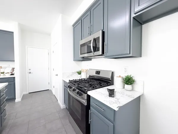 a view of cabinets and window