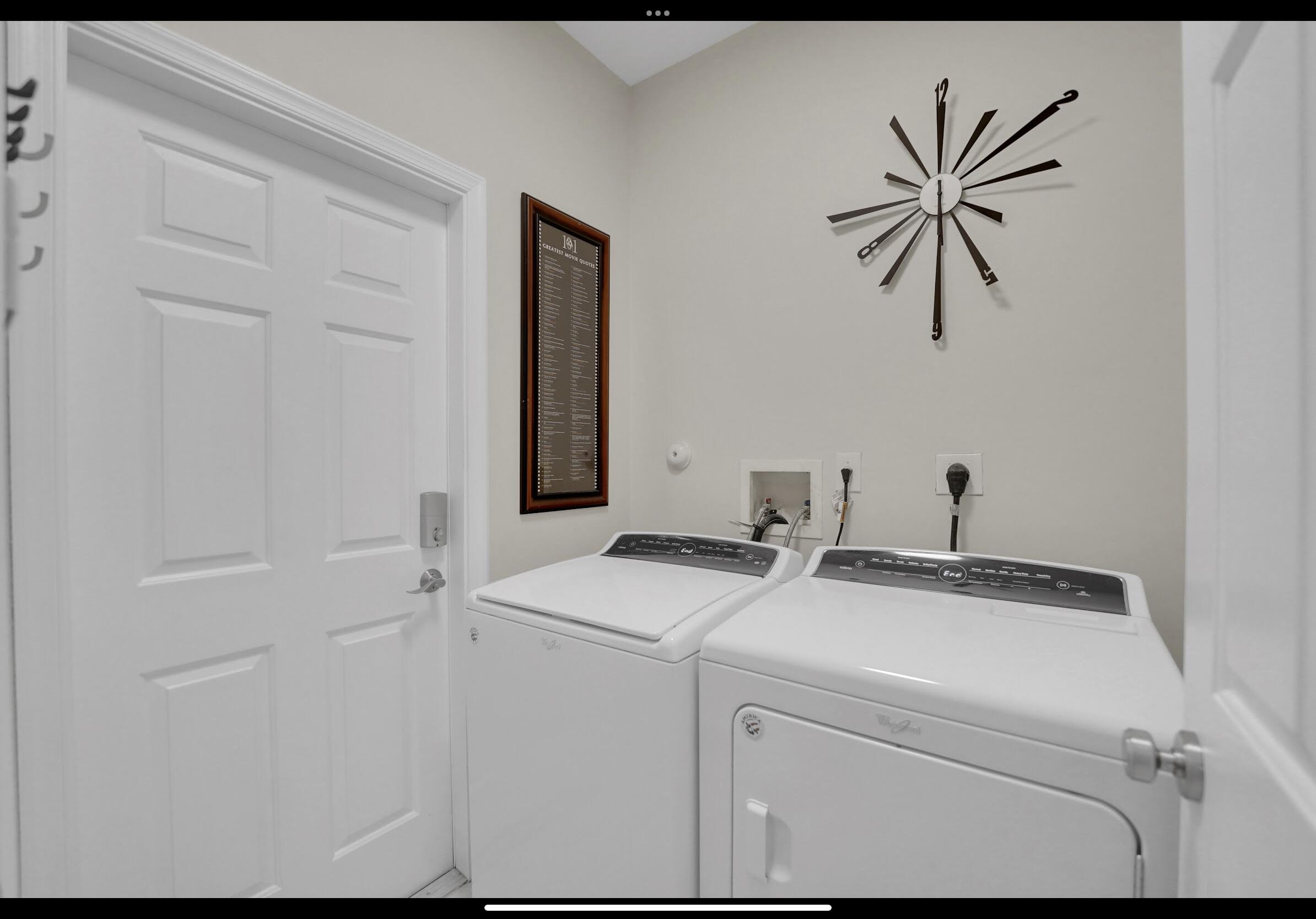 7922 Monarch Court Delray Beach, FL 33446 - Photo 16 of 31 a utility room with dryer and washer