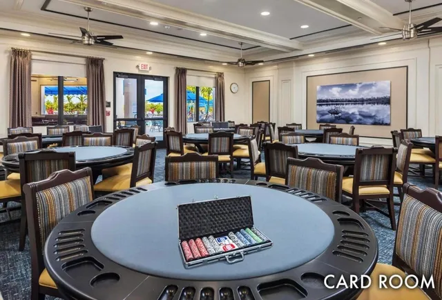 a living room with furniture a rug and a flat screen tv