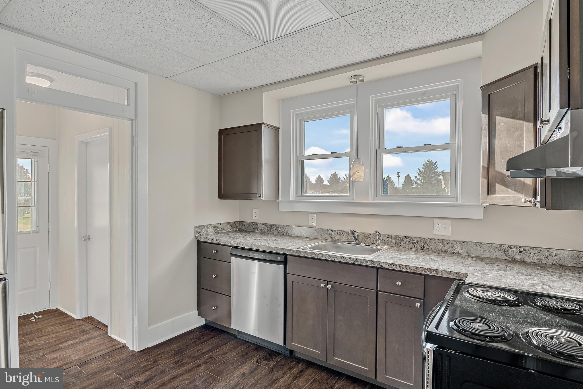 206 Hershey Road Hummelstown, PA 17036 - Photo 8 of 26 a kitchen with granite countertop cabinets stainless steel appliances and a sink