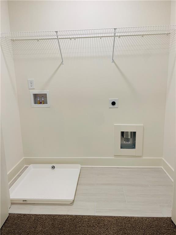 72 Garrison Drive Winder, GA 30680 - Photo 12 of 20 a bathroom with a tub and shower