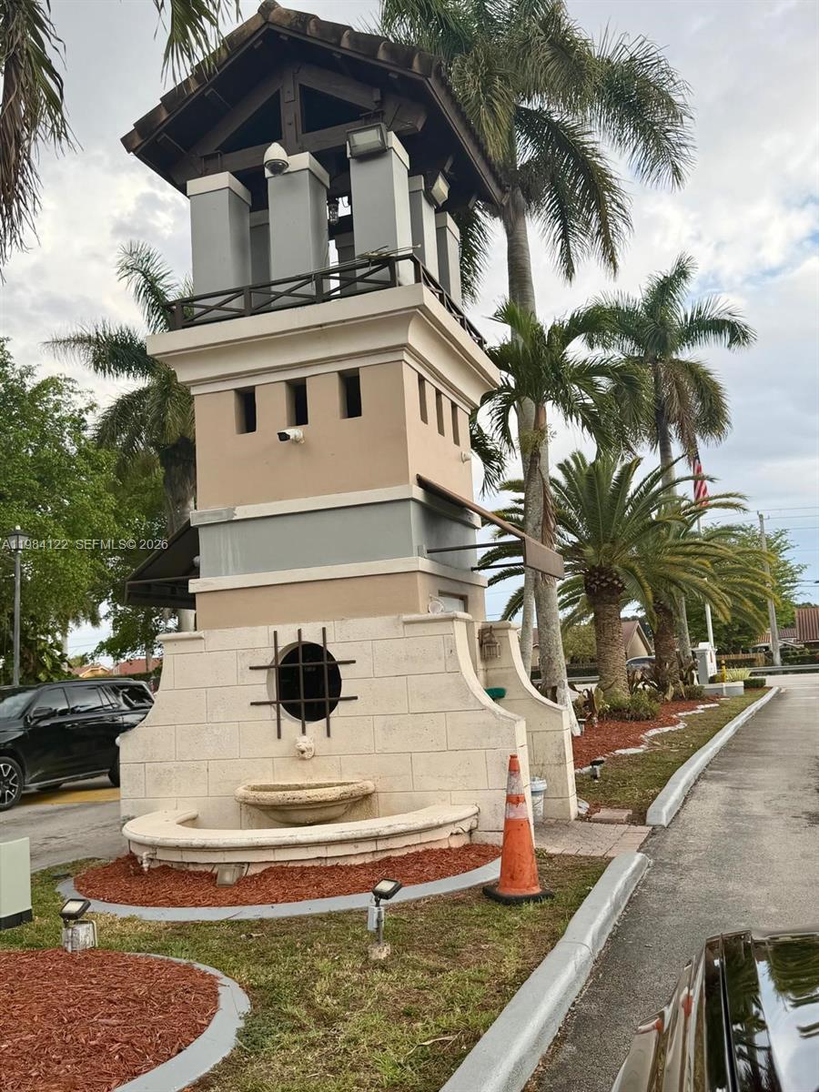 3858 Southwest 153rd Place Miami, FL 33185 - Photo 2 of 37 a white building with a view of the house