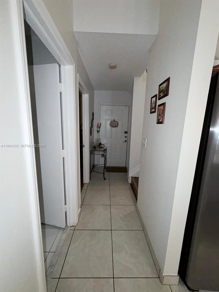 3858 Southwest 153rd Place Miami, FL 33185 - Photo 26 of 37 a view of a hallway