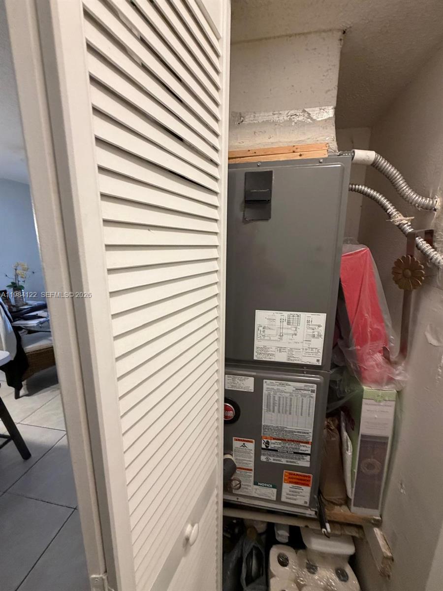 3858 Southwest 153rd Place Miami, FL 33185 - Photo 27 of 37 a view of storage and utility room