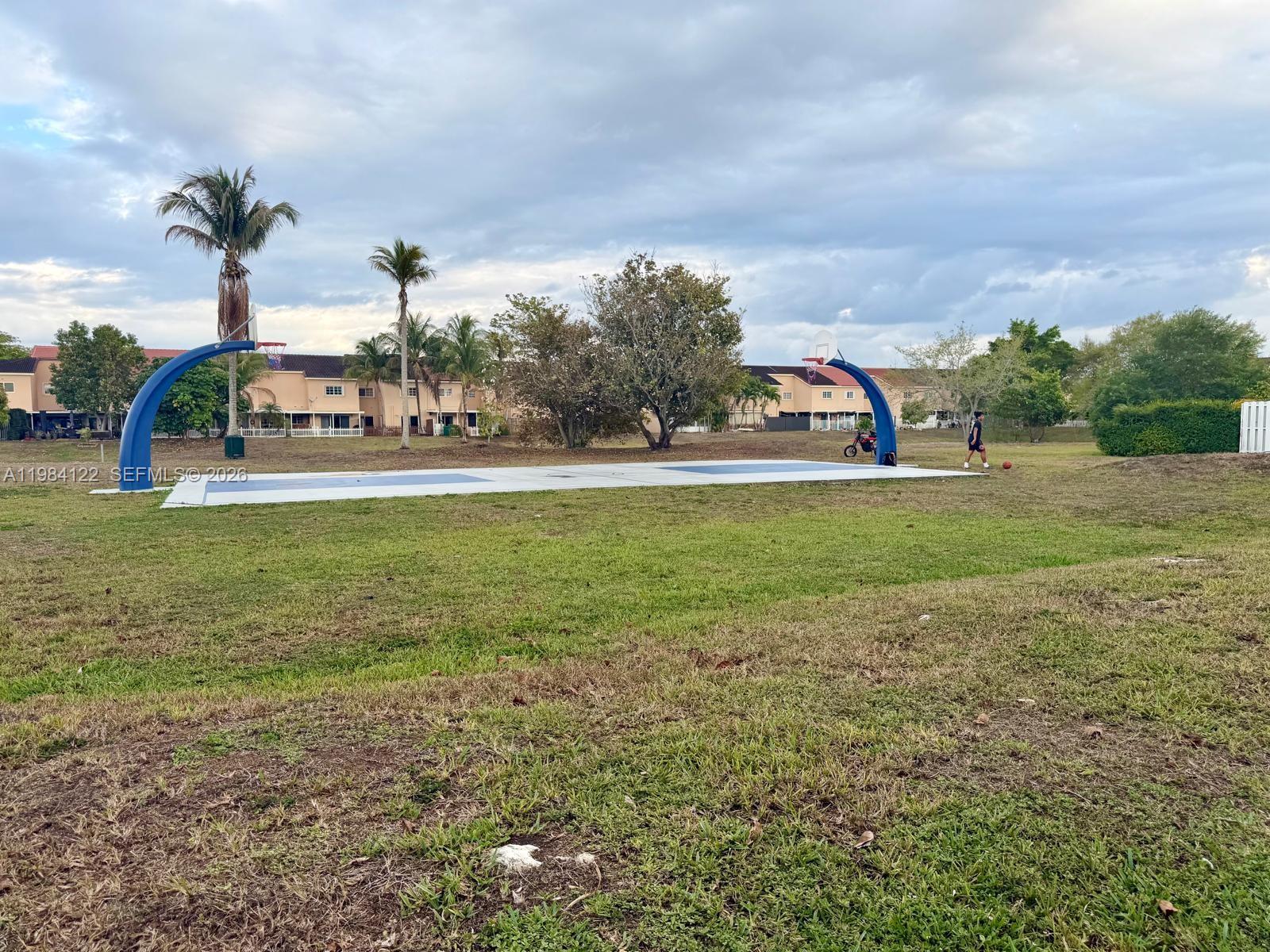 3858 Southwest 153rd Place Miami, FL 33185 - Photo 32 of 37 a view of a fountain in front of the house