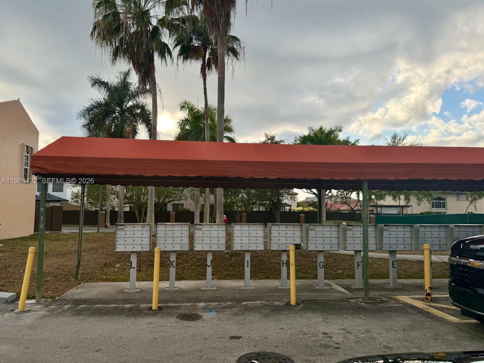 3858 Southwest 153rd Place Miami, FL 33185 - Photo 35 of 37 a view of a backyard with table and chair