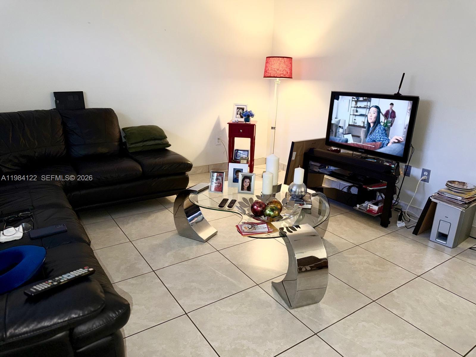 3858 Southwest 153rd Place Miami, FL 33185 - Photo 9 of 37 a living room with furniture