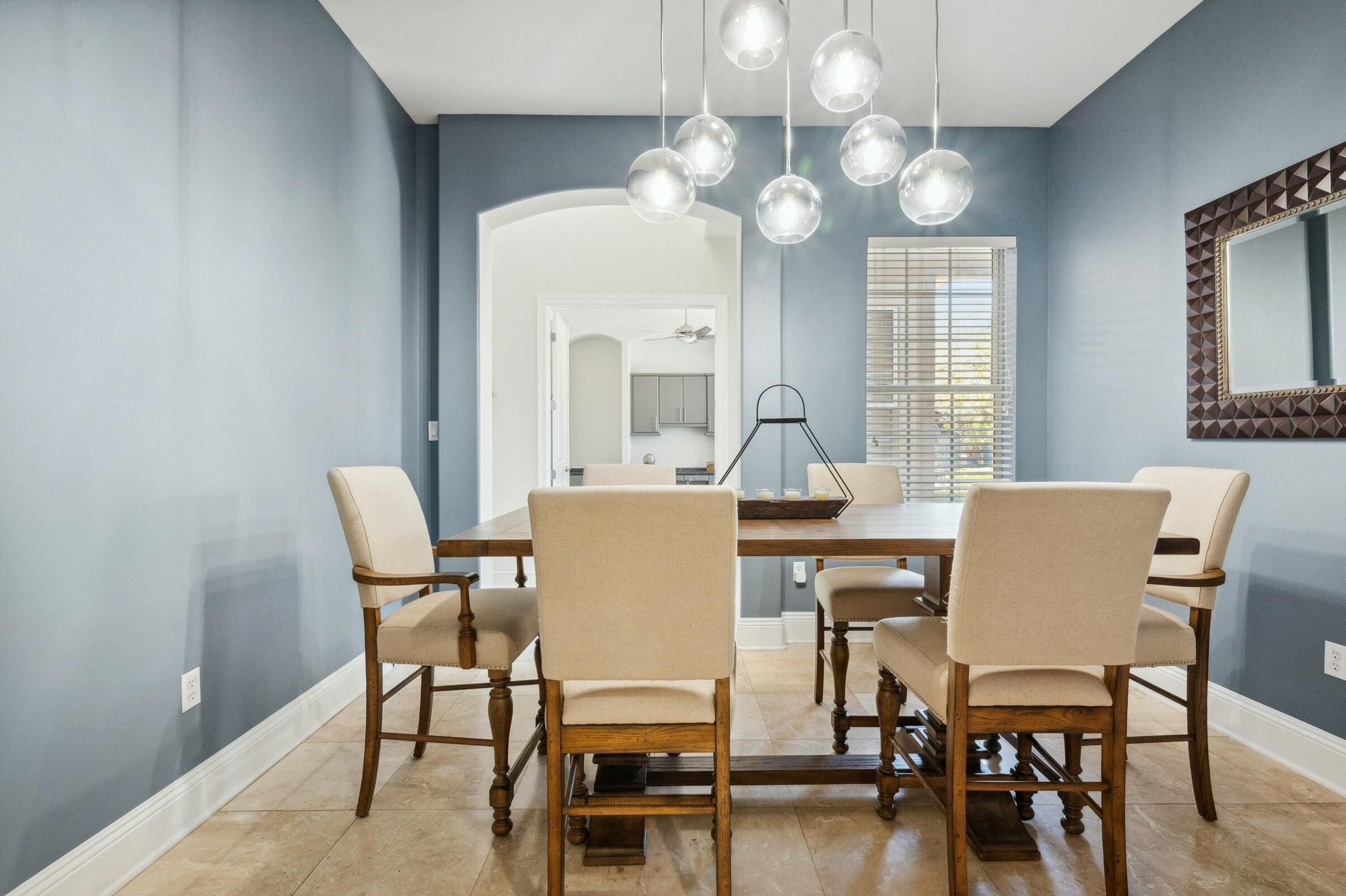 294 Ketch Court Destin, FL 32541 - Photo 11 of 56 a view of a dining room with furniture and wooden floor