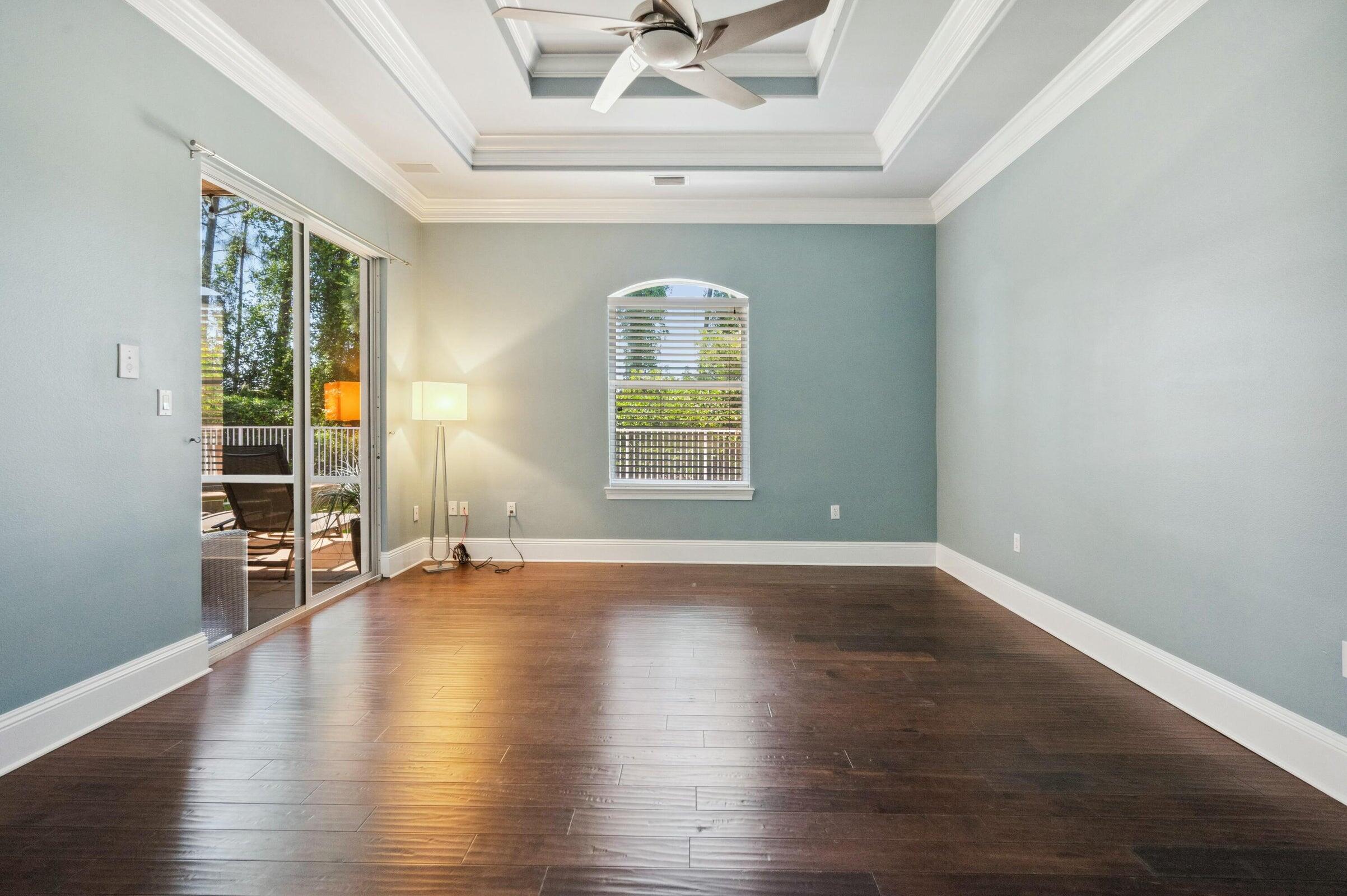294 Ketch Court Destin, FL 32541 - Photo 21 of 56 a view of an empty room with wooden floor and a window