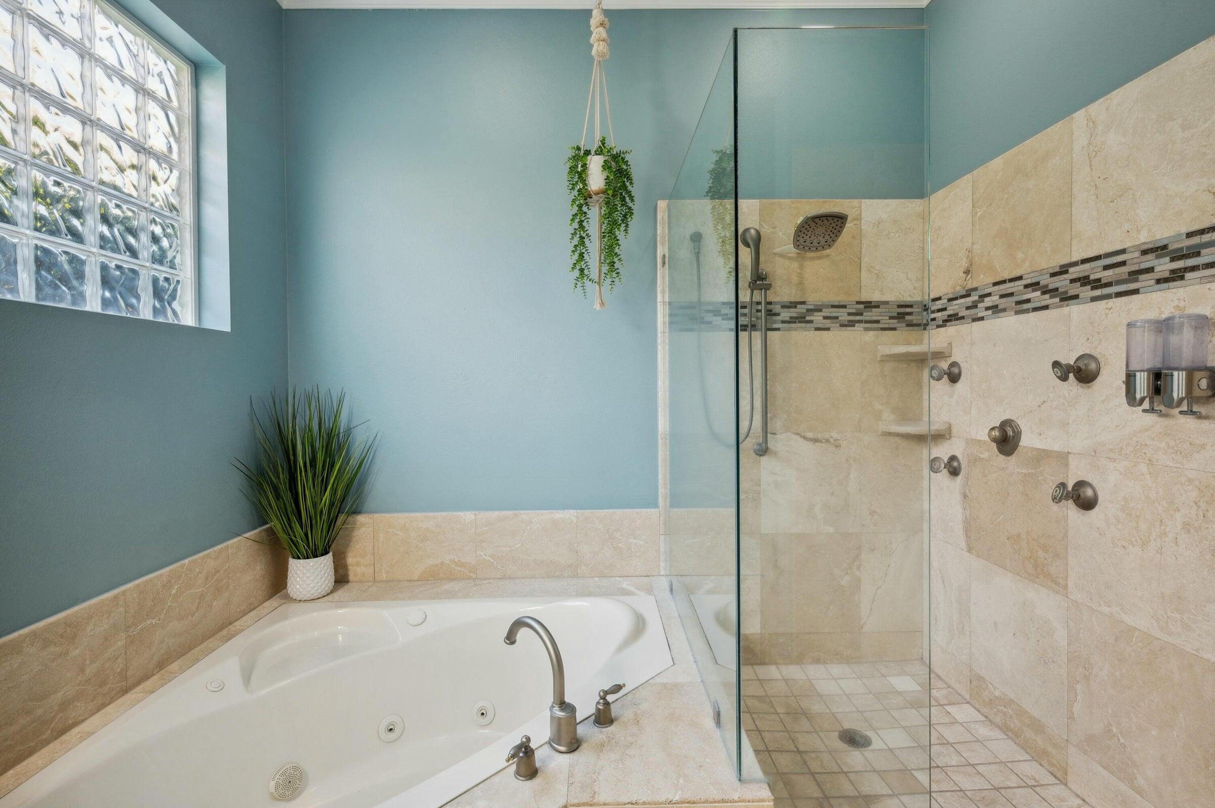 294 Ketch Court Destin, FL 32541 - Photo 26 of 56 a bathroom with a bathtub and shower