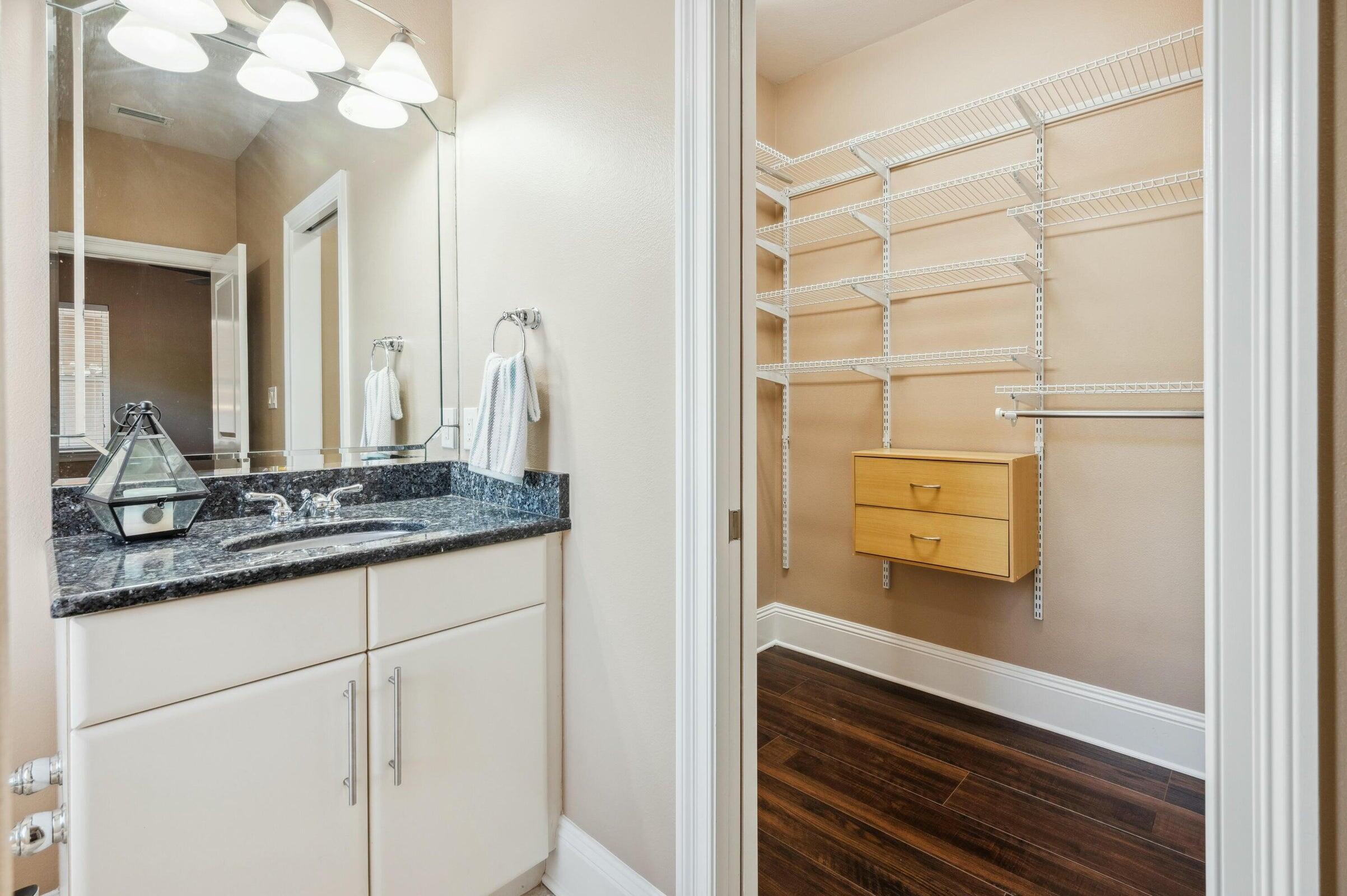 294 Ketch Court Destin, FL 32541 - Photo 33 of 56 a bathroom with a sink and a mirror