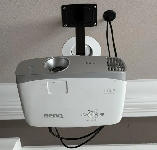 a view of a house with pool and chairs