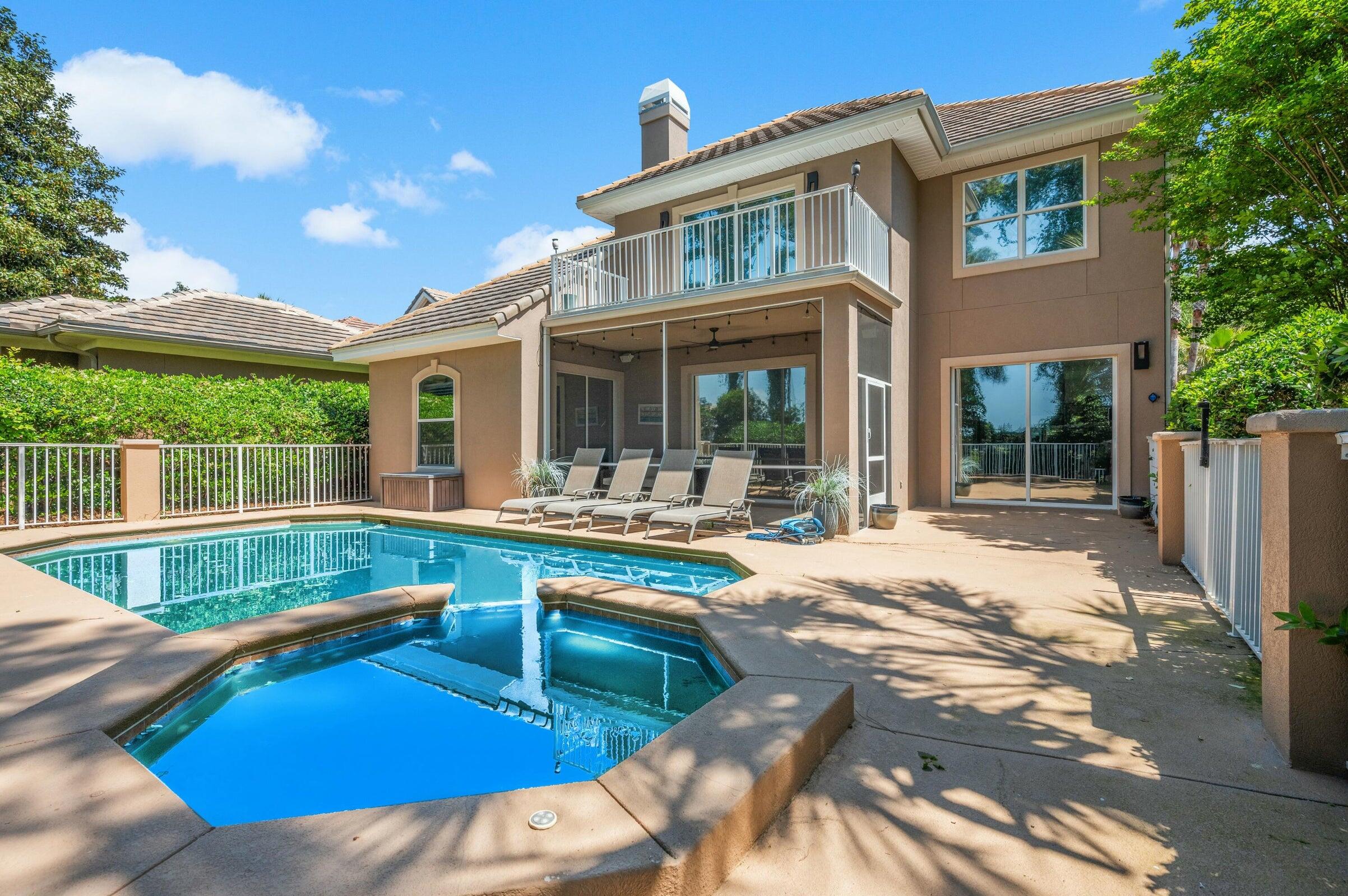 294 Ketch Court Destin, FL 32541 - Photo 43 of 56 a view of a house with pool and chairs