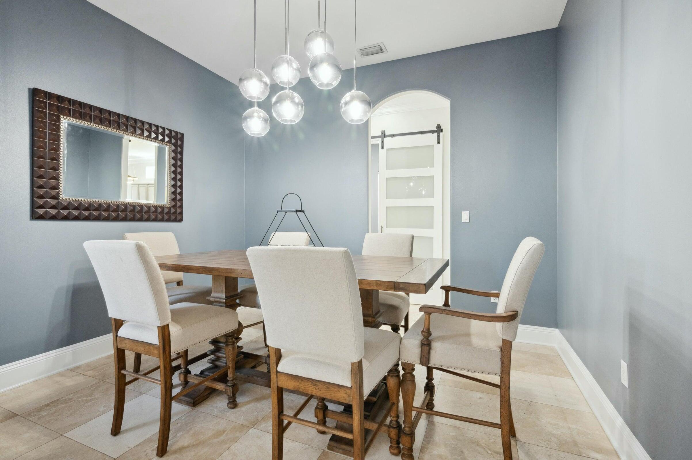 294 Ketch Court Destin, FL 32541 - Photo 10 of 56 a view of a dining room with furniture and chandelier