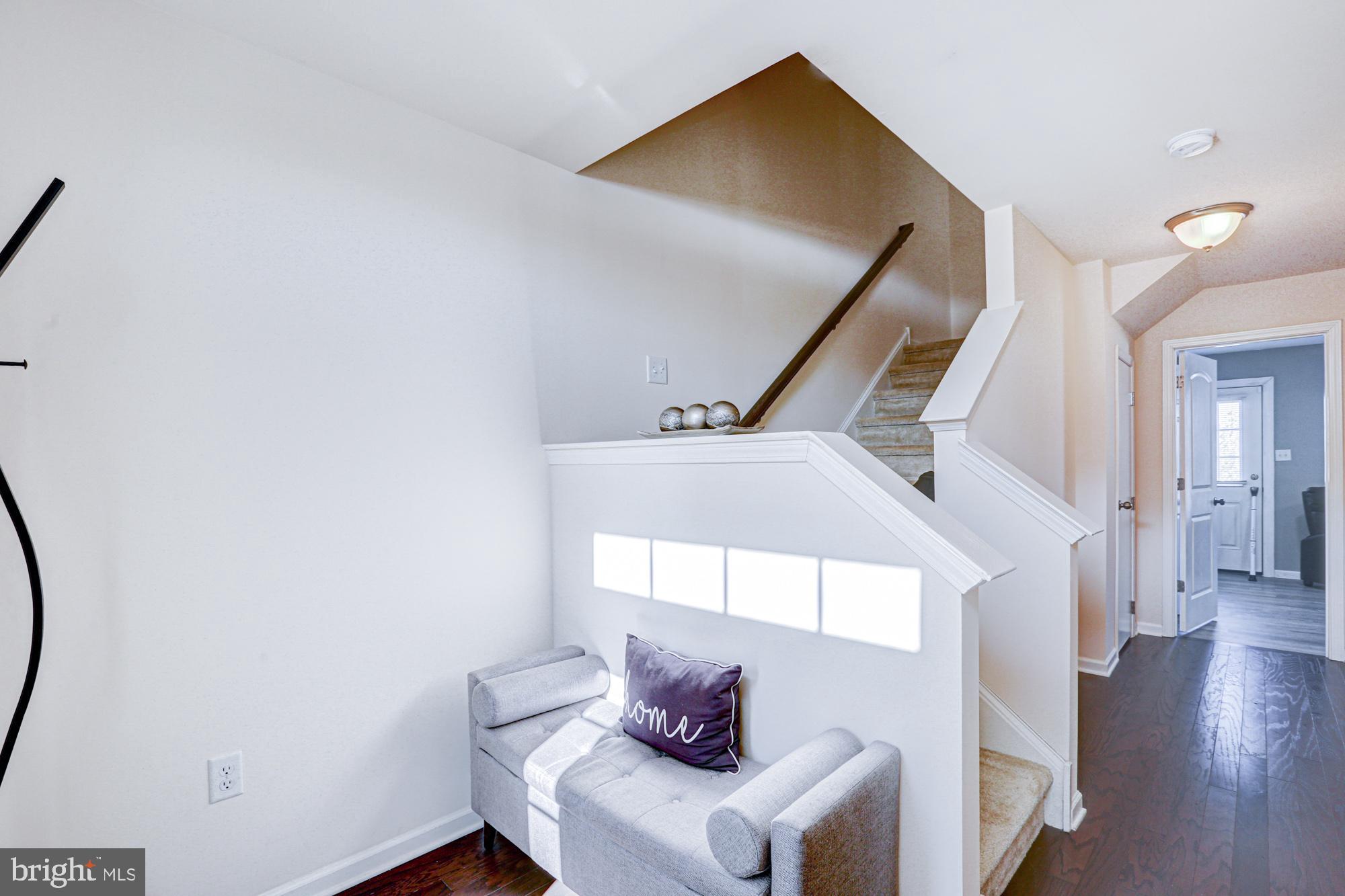 1102 Wickersham Way Middletown, DE 19709 - Photo 14 of 68 a workspace with furniture and wooden floor