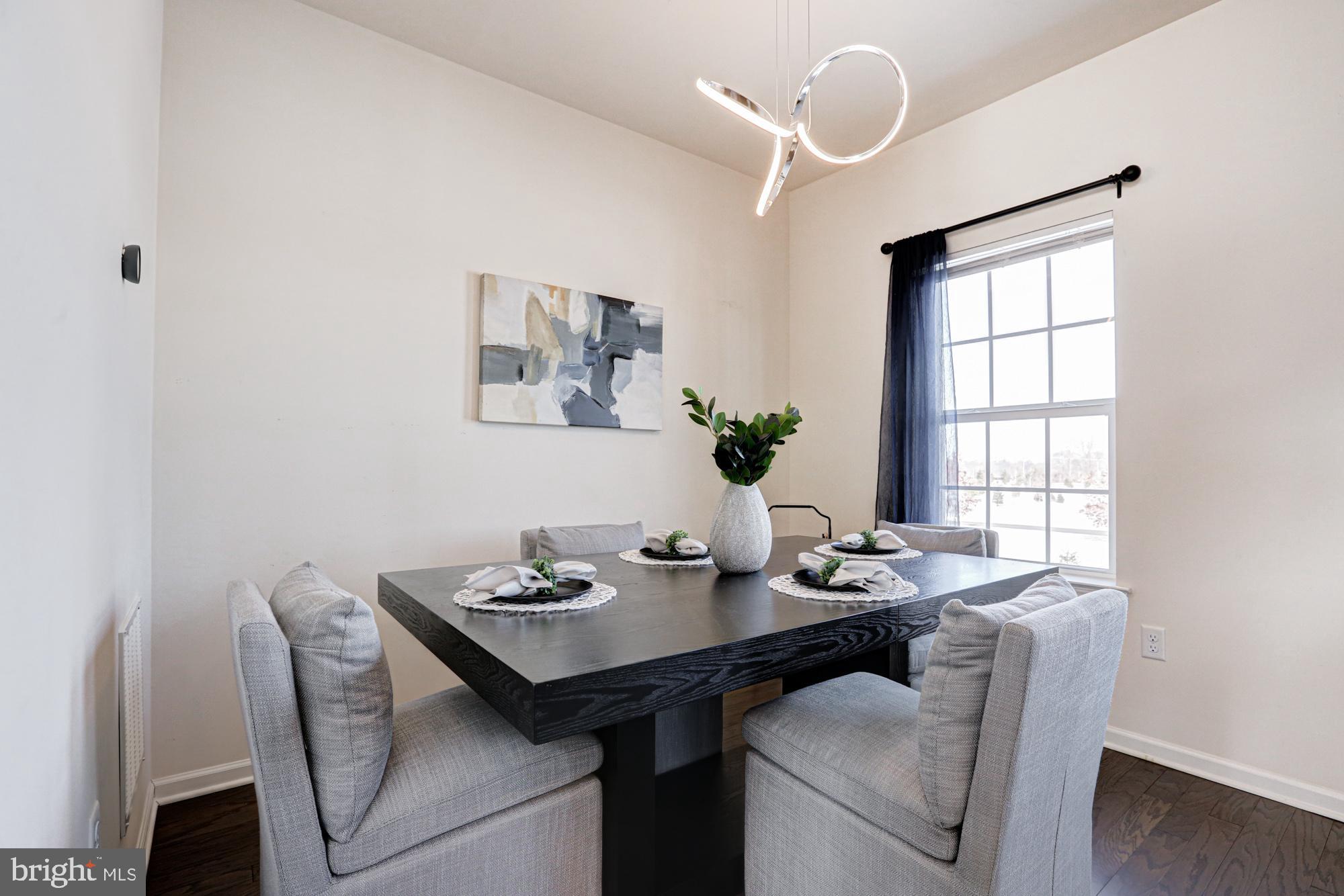 1102 Wickersham Way Middletown, DE 19709 - Photo 35 of 68 a view of a dining room with furniture window and outside view