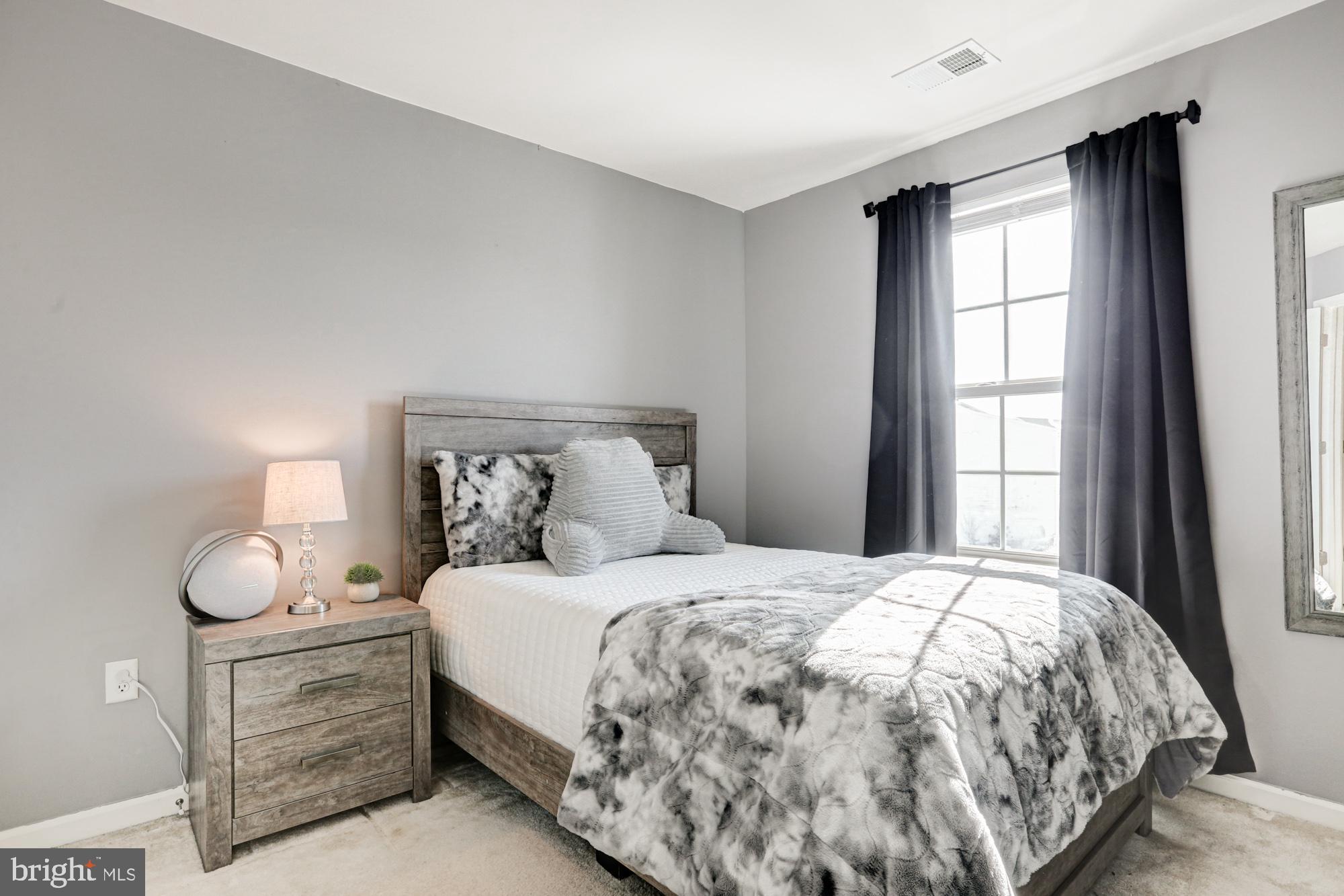 1102 Wickersham Way Middletown, DE 19709 - Photo 49 of 68 a bedroom with a bed and window