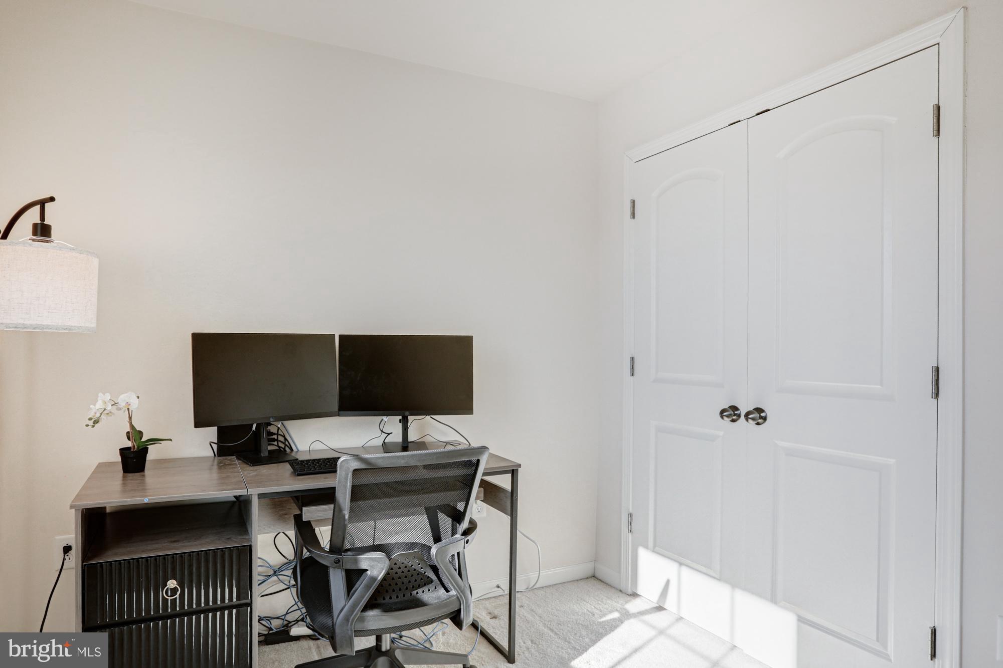 1102 Wickersham Way Middletown, DE 19709 - Photo 54 of 68 a view of a workspace with furniture and wooden floor