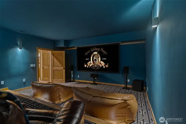 a bed sitting in a room next to a window