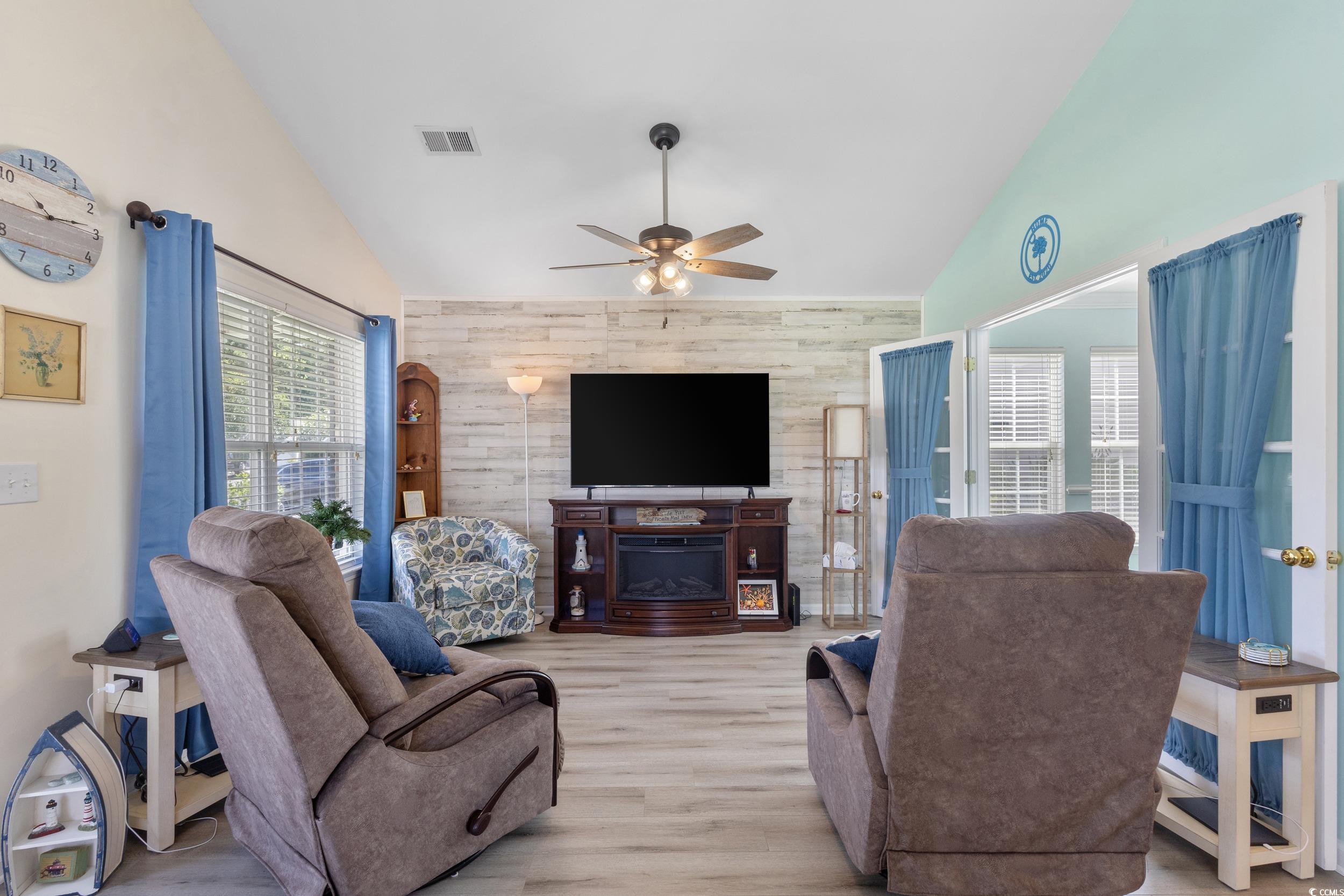 283 Whitchurch Street Murrells Inlet, SC 29576 - Photo 11 of 40 Living room featuring high vaulted ceiling, a ceil