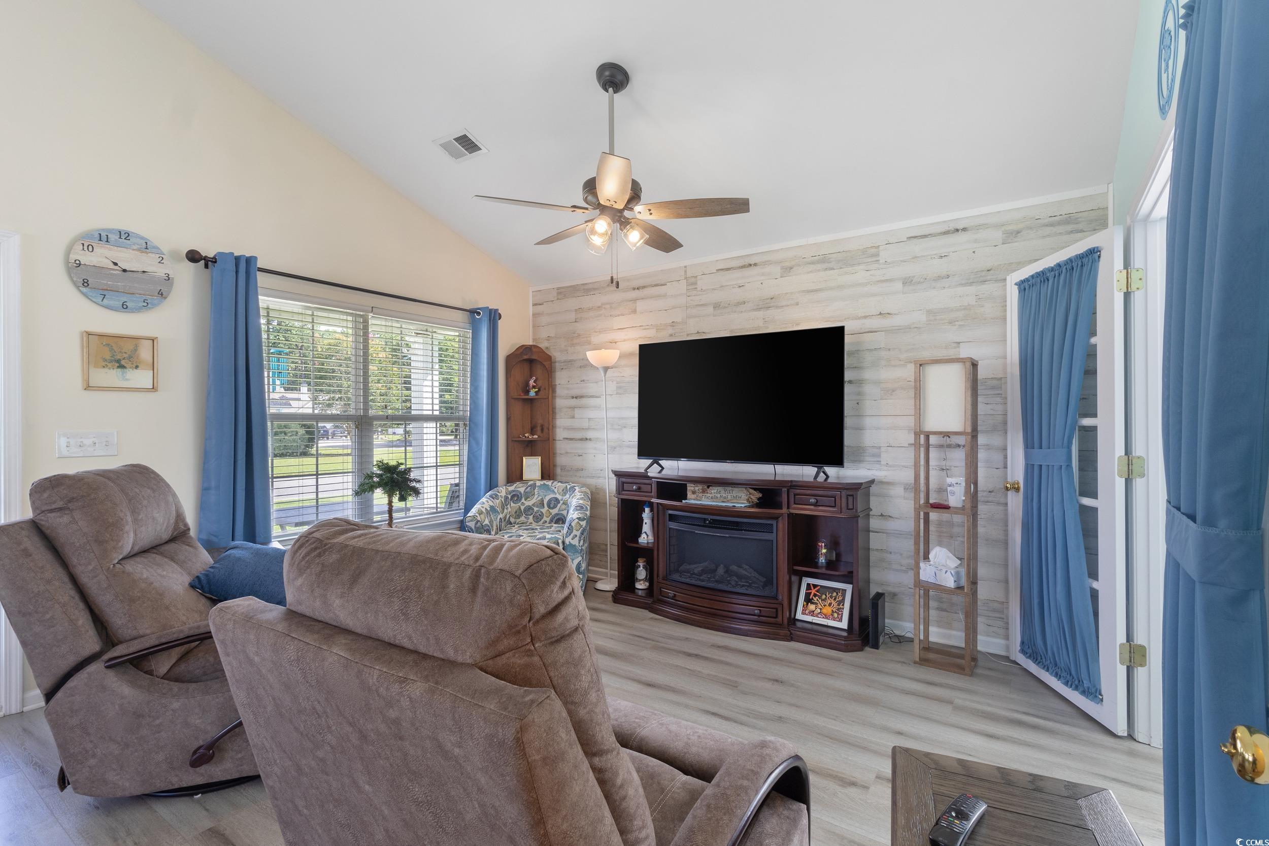 283 Whitchurch Street Murrells Inlet, SC 29576 - Photo 12 of 40 Living room with a ceiling fan, vaulted ceiling, w