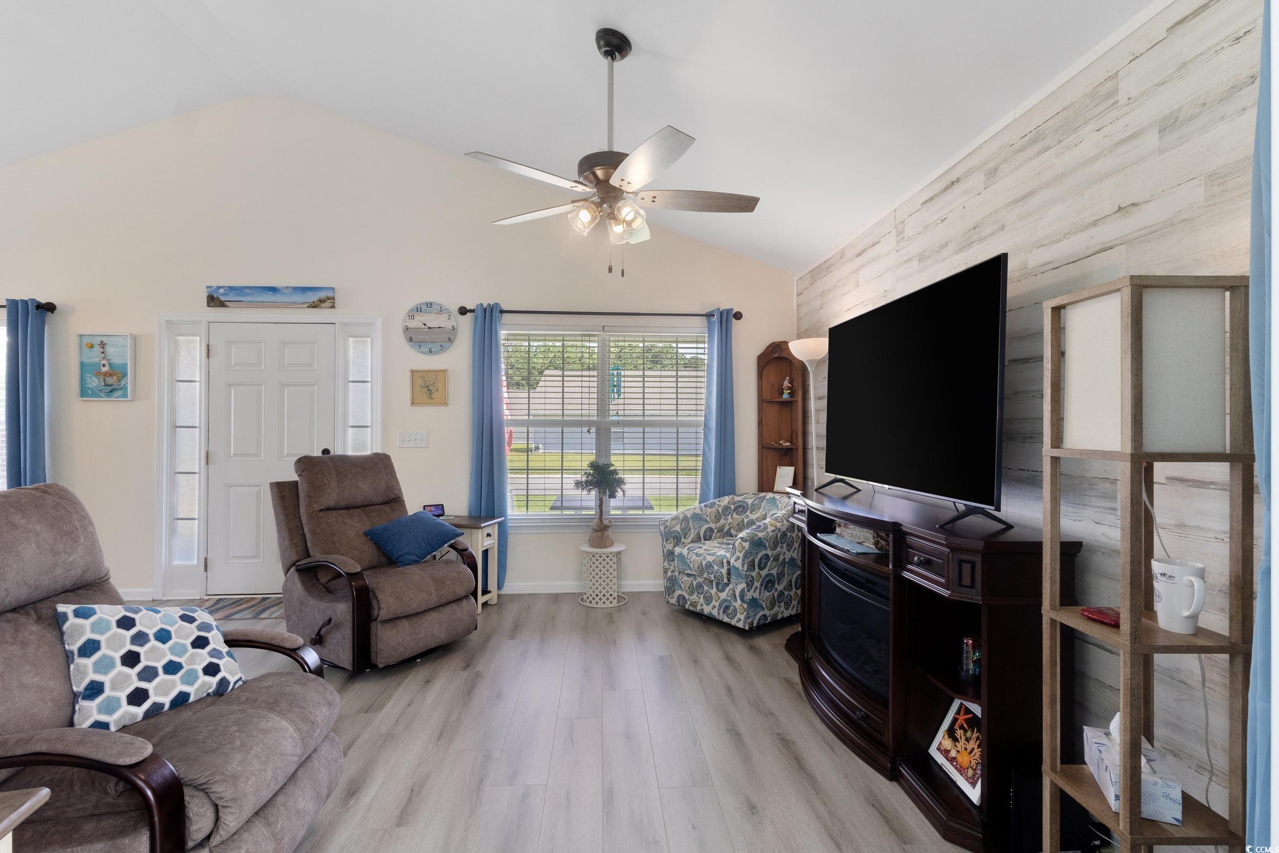 283 Whitchurch Street Murrells Inlet, SC 29576 - Photo 13 of 40 Living room featuring lofted ceiling, ceiling fan,