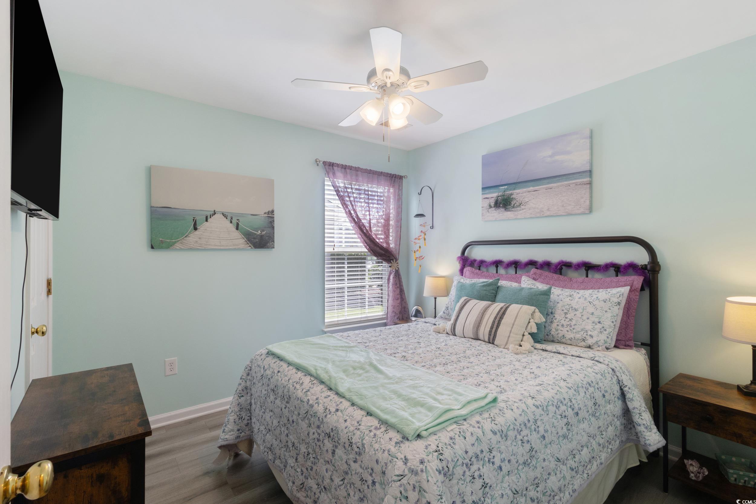 283 Whitchurch Street Murrells Inlet, SC 29576 - Photo 21 of 40 Bedroom featuring wood finished floors and a ceili