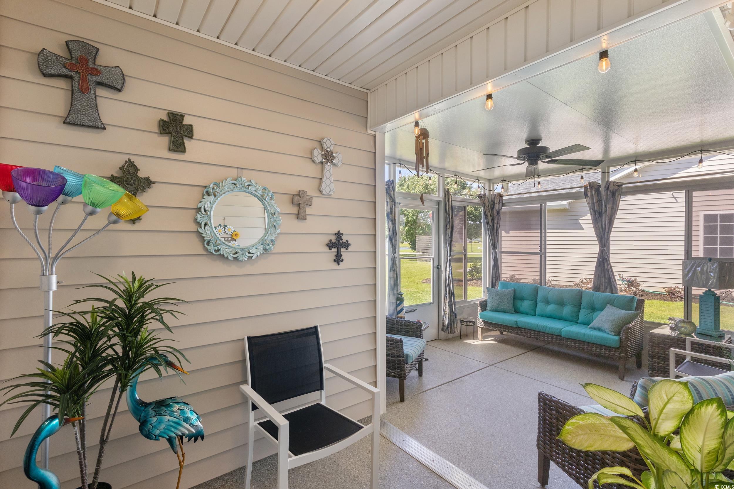 283 Whitchurch Street Murrells Inlet, SC 29576 - Photo 23 of 40 Sunroom with ceiling fan and outdoor lounge area