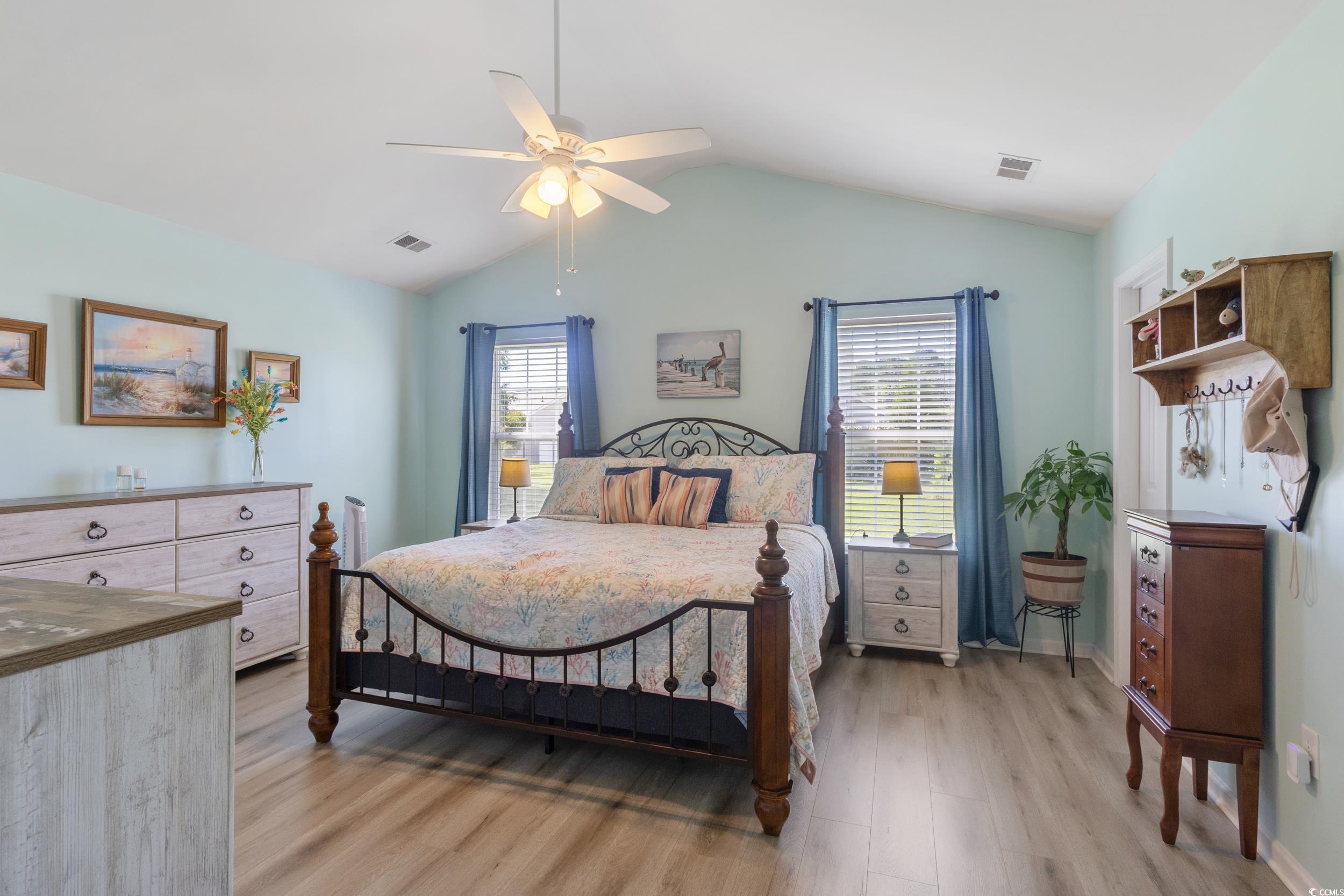 283 Whitchurch Street Murrells Inlet, SC 29576 - Photo 31 of 40 Bedroom with light wood-style flooring, vaulted ce
