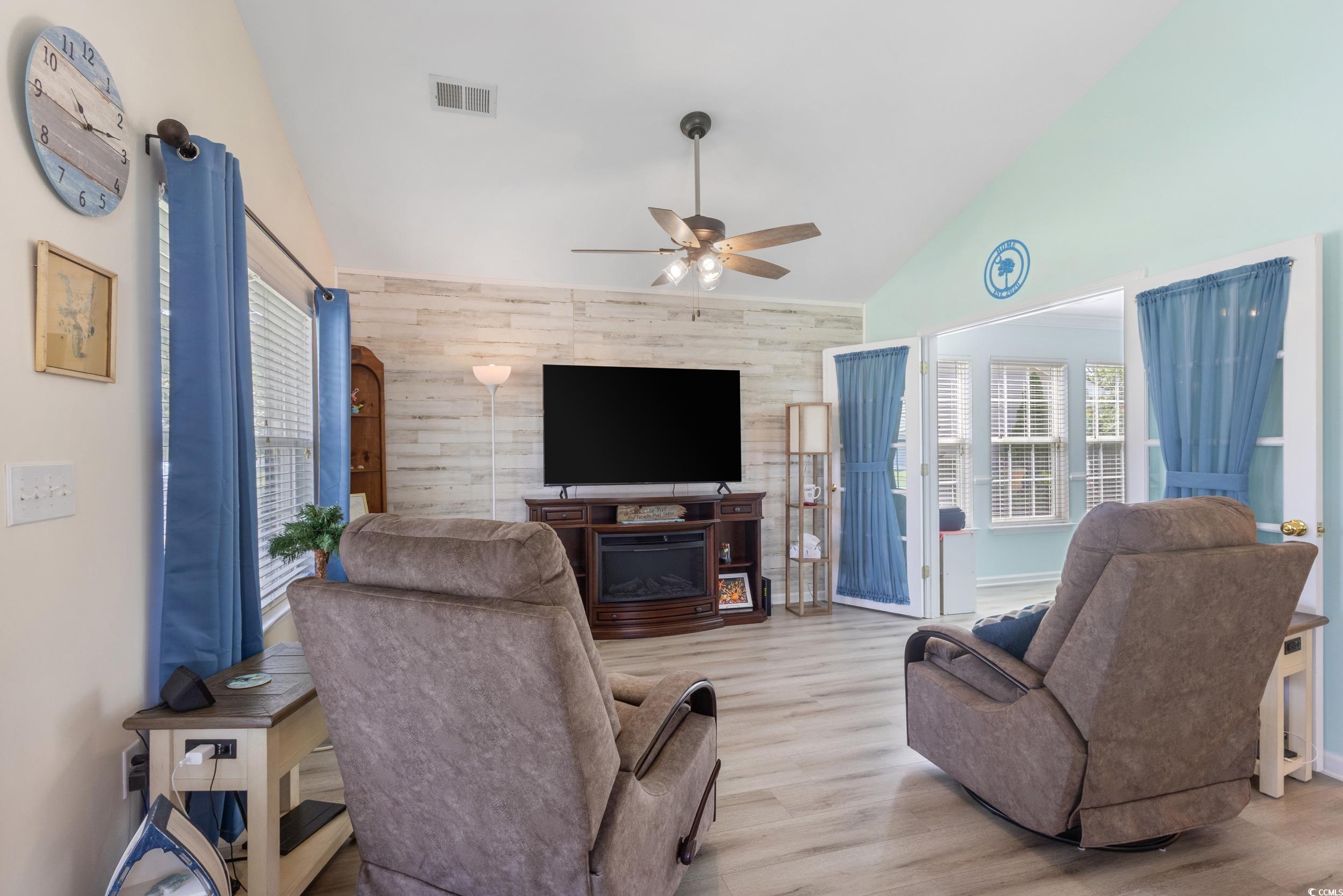283 Whitchurch Street Murrells Inlet, SC 29576 - Photo 10 of 40 Living room featuring ceiling fan, wood finished f